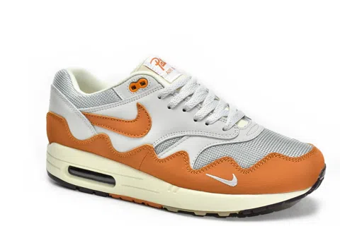 Patta x Nike Air Max 1 Monarch – photo 4